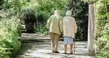 Elderly couple enjoying a nature walk
